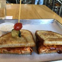 Buffalo Chicken Sandwich · Marinated chicken breast, with Swiss, and DGC wing sauce on grilled sourdough.