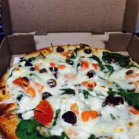 Mediterranean Pizza · Feta cheese, Kalamata olives, fresh spinach and fresh tomatoes.