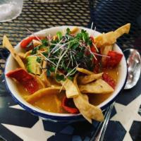 Tortilla Soup · Shredded chicken on a tangy chicken broth, topped with avocado, tortilla strips, and Oaxaca ...
