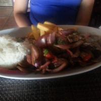 Saltados · The perfect fusion peruvian - cantonese, wok stir fry or beef, chicken sauteed with onions, ...