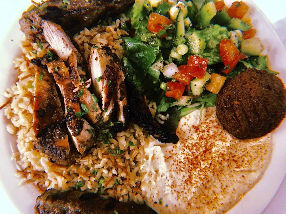 Flavor Savor Special Plates · Chicken mishwi and beef kafta on a bed of brown rice with vermicelli, served with greens, hummus, and falafel. Nuts.