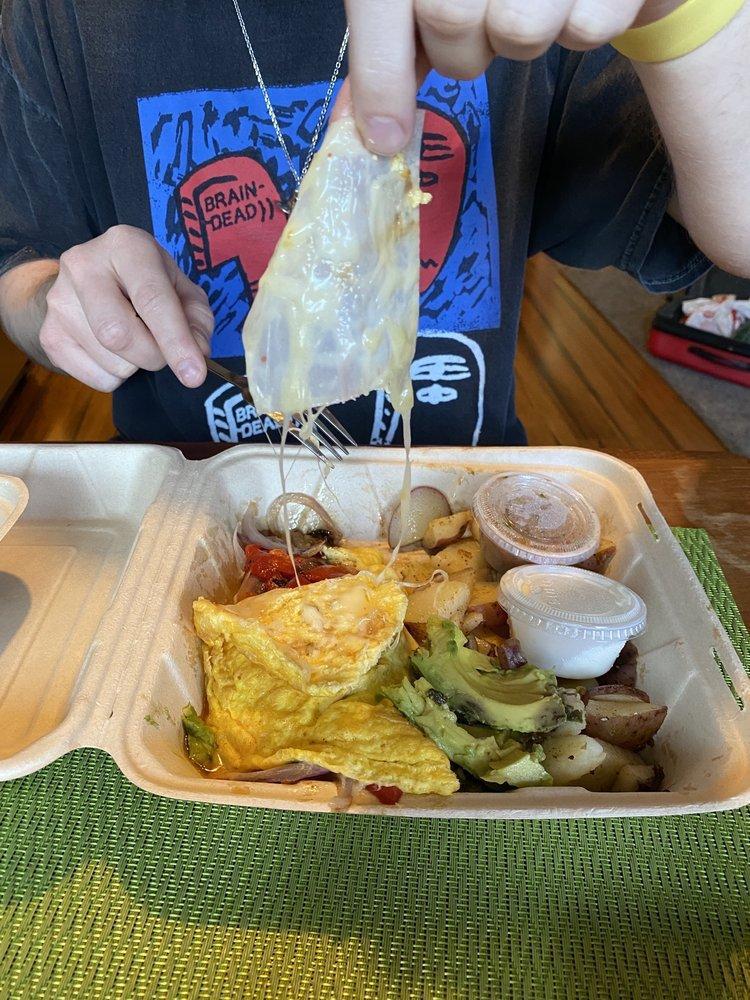 South of the Border Omelette Breakfast · Pepper jack cheese, onions, pepper, avocado, topped with salsa and sour cream. Our Omelettes are made with 3 organic eggs.