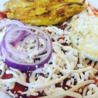 Chilaquiles · Tortilla casserole with chicken, green or red sauce, rice, and beans.