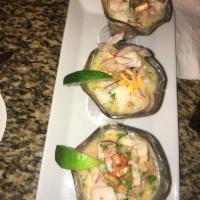 Ceviche Trio · Our fish ceviche served with 3 spice flavorings; original, spiced with Aji Amarillo, and spi...