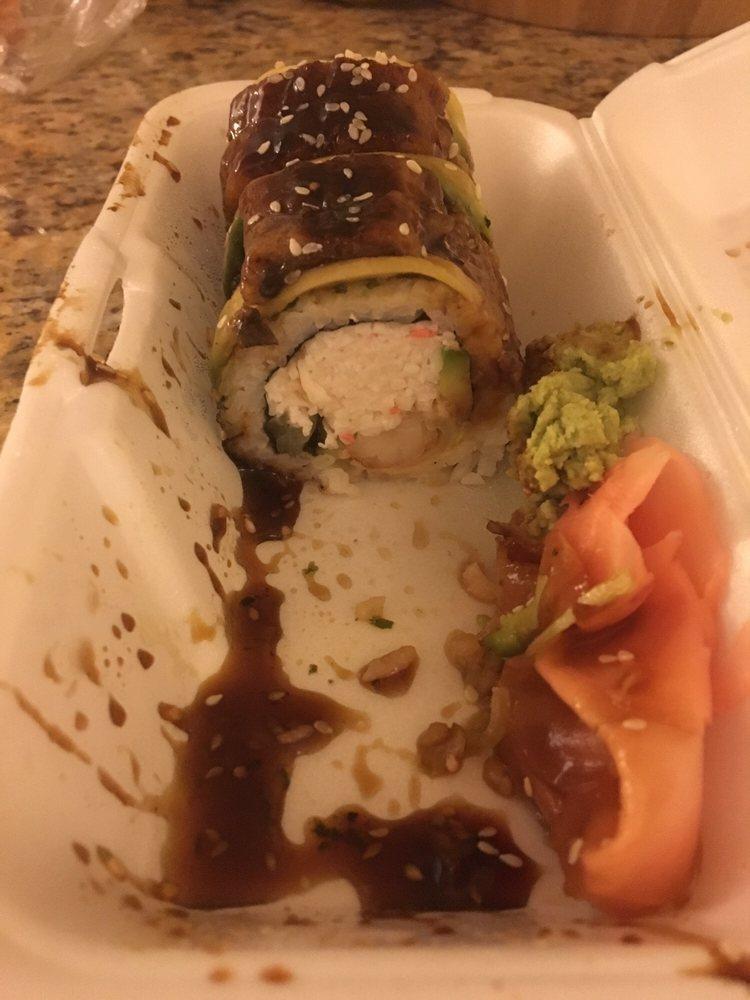 Dragon Roll · Crab, cucumber, avocado, tempura shrimp unagi and avocado with eel sauce in top.