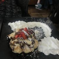 Belgium Special Crepe · Liege waffle, banana, strawberry, ice cream and Nutella.