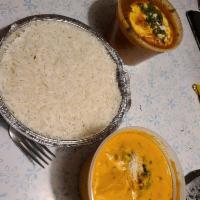 Chicken Korma · Chicken pieces delicately flavored with coconut and gently simmered in yogurt with a selecti...