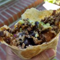 Santa Fe Burrito · Served with beans, guacamole, rice, pico de gallo, cheese, sour cream, cabbage, onions, cila...