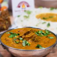 Daal Goat · Goat meat prepared in a mix of lentils and stewed with cumin and fresh spices.