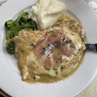 Chicken Saltimbocca · Sauteed chicken breast, white wine topped with prosciutto, fontina cheese and sage, served w...