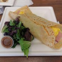 Parisienne · Savory Crepe filled with egg, ham, cheese (Swiss or Cheddar), lettuce, tomato, red onion and...