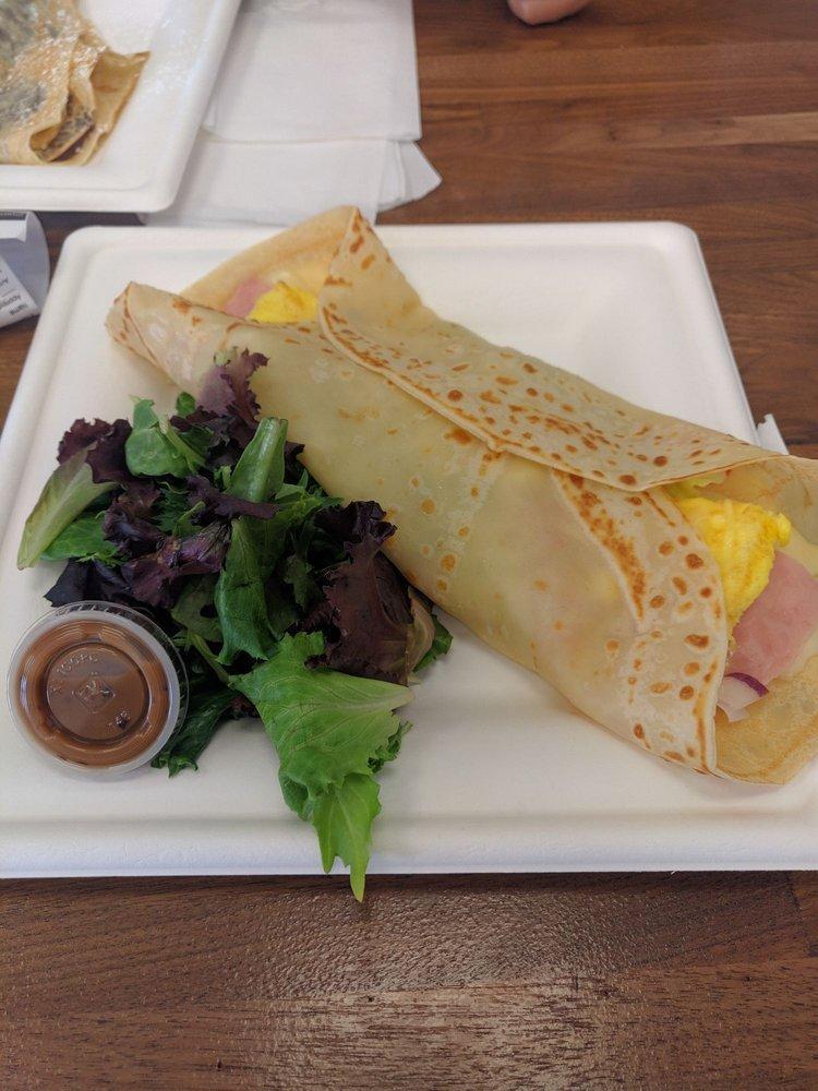 Parisienne · Savory Crepe filled with egg, ham, cheese (Swiss or Cheddar), lettuce, tomato, red onion and hollandaise. With side of salade (Ranch or Balsamic)