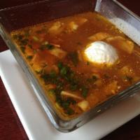 Tortilla Soup · A traditional Mexican cuisine soup! Distinctly combined flavors and textures of tortilla str...