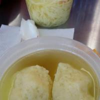 Matzoh Ball Soup · Matzoh ball in chicken broth, chicken breast and carrots. Sold cold unless specified.