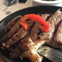 Rib Eye Steak · 14 oz. certified Angus choice grilled rib eye steak.