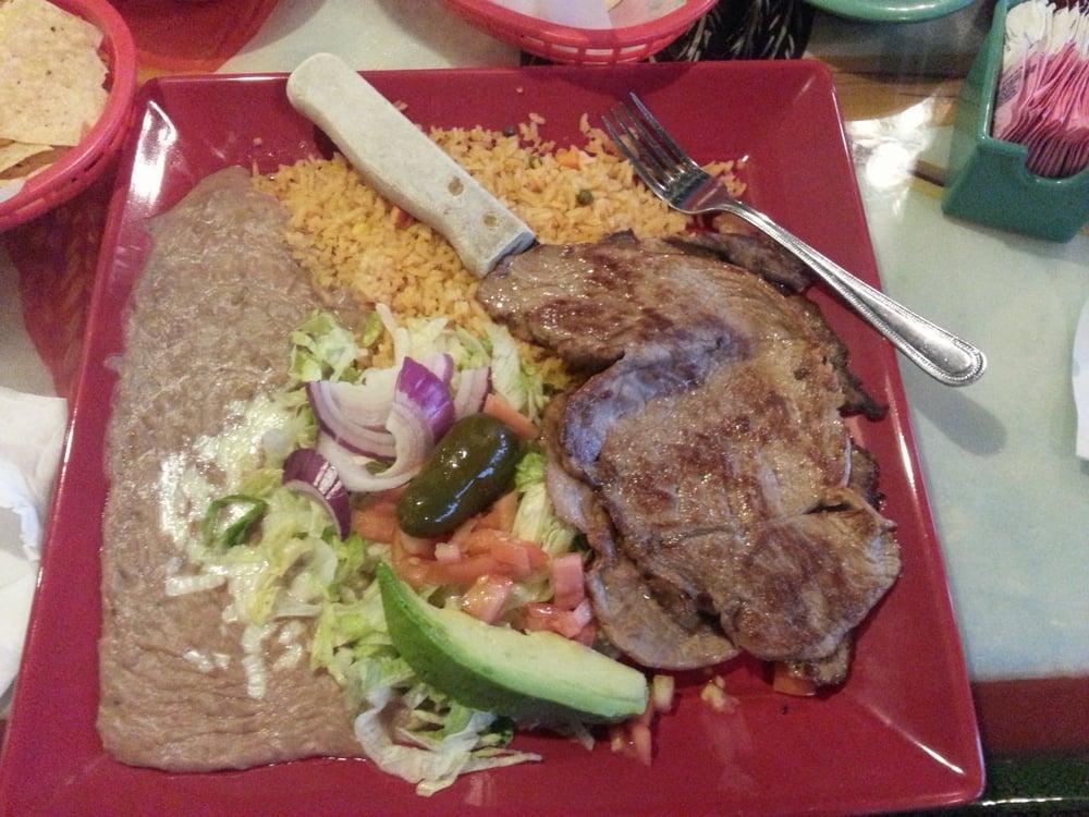 Carne Asada · Our special recipe grilled steak. Garnished with lettuce tomato, onion, avocado, jalapeno and three tortillas.