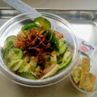 Yuzu Salmon Bowl · Yuzu kosho sauce, avocado, edamame, cilantro jicama and cucumber. Made with the poke basics ...