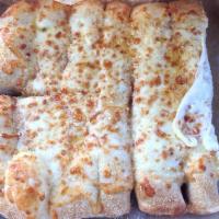 Cheezybread · Fresh-baked bread strips with our signature three cheeses and garlic sauce, served with a si...