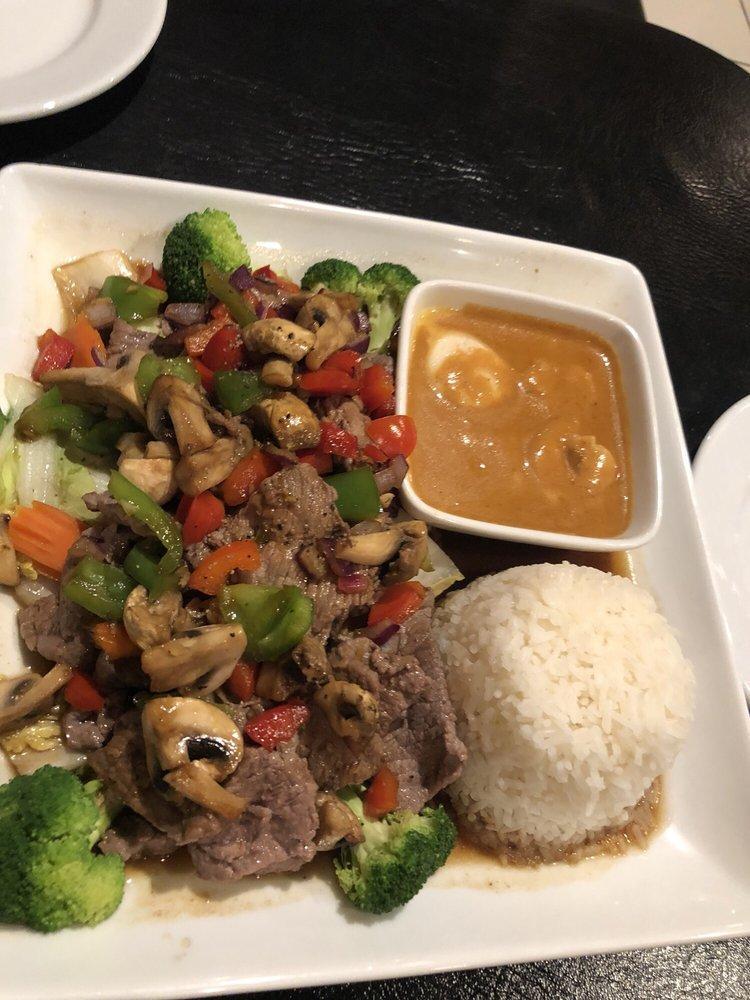 East Meets West · A sampling of 2 different tastes in Thai cooking. Grilled marinated steak covered in our delicious
mushroom and pepper sauce. Pair with shrimp and scallops stewed in our delicious curry. Served with white rice. Substitute with fried rice for an additional charge.
