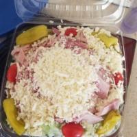 Antipasto Salad · Fresh crisp lettuce, tomatoes, pepperoncini peppers, ham, salami, provolone cheese and Itali...
