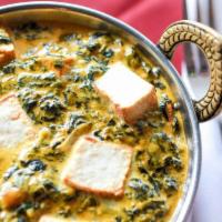 Saag Paneer · Chopped ‘Saag’ (spinach) prepared in a delightfully light cream sauce with cubed ‘Paneer’ (c...