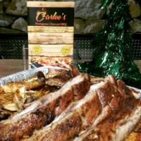 Pork Ribs · Served with the choice of 2 side items. Seasoned with Carlee's house sauce.