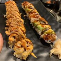 God Bless America Roll · Shrimp tempura, spicy imitation crab meat, avocado, topped with crunchy onions and house sau...