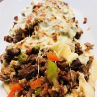 Tacos Chetumal · Three steak or chicken tacos with bacon, bell peppers, and melted chihuahua cheese. New Rebo...