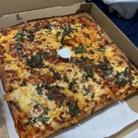 Large La Nonna Pizze · The grandma pizza. Fresh garlic, fresh mozzarella and homemade marinara topped with fresh ba...