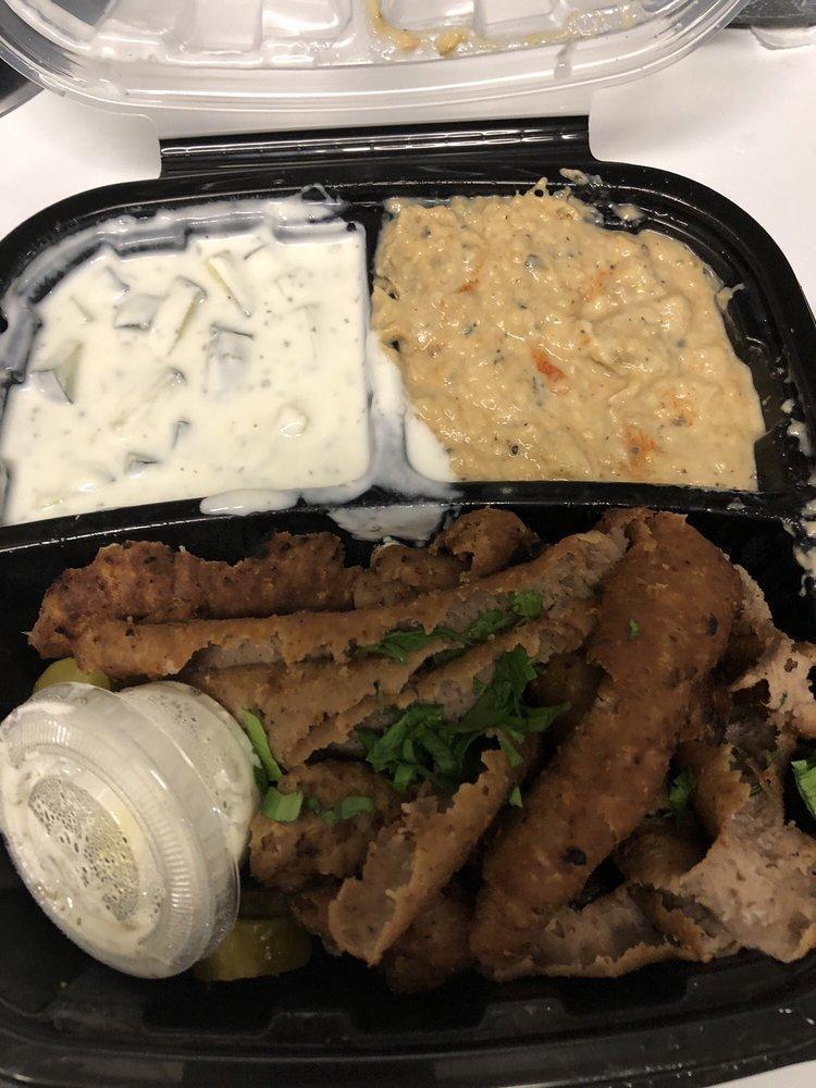Gyro Meat · A traditional, flavorful mix of sliced beef and lamb served with tomatoes, pickles, fresh sliced onions and topped with tzatziki sauce.