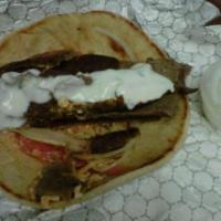 Feisty Gyro · Lamb, beef, onions, tomatoes, spicy feta cheese, and cucumber sauce.