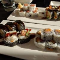 Crazy Maki Roll · Shrimp tempura, cucumber, avocado, tobiko, spicy mayo and eel sauce.