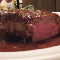 Prime Filet Mignon · Served with house whipped potatoes and braised Swiss chard in a port wine demi glaze.