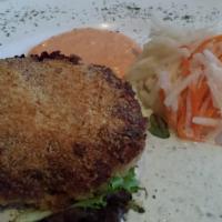 Maryland Style Crab Cake · Jumbo lump crab served with a remoulade sauce and roasted red pepper vinaigrette.