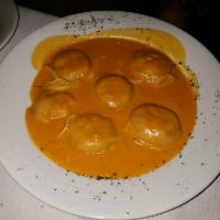 Lobster Ravioli · Stuffed with maine lobster, ricotta cheese and fresh herbs in a sweet lobster cream sauce.