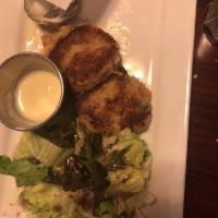 Crab Cakes · Three pan seared seasoned cakes served with whole grain dijon cream sauce, served with pita ...