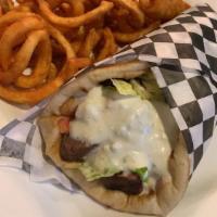 Beef Pita · Charbroiled kabob with onions and peppers, stuffed in a pita with tzatziki sauce, lettuce an...