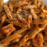 Penne Vodka · Fresh, homemade penne pasta, in a light tomato cream sauce with capers, shallots and a hint ...