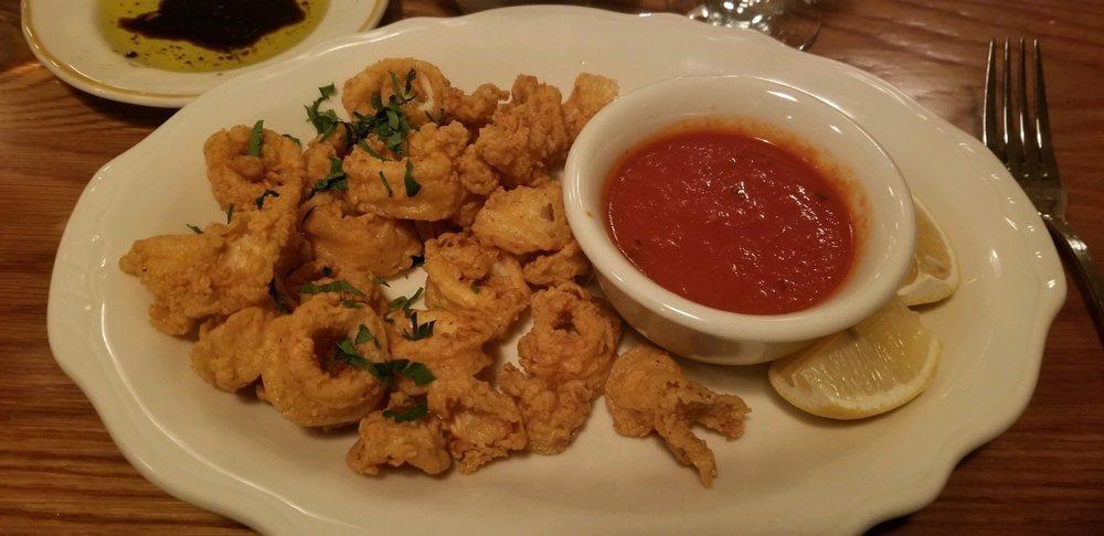 Fried Calamari · Lightly coated and fried to a golden brown, served with a side of marinara sauce