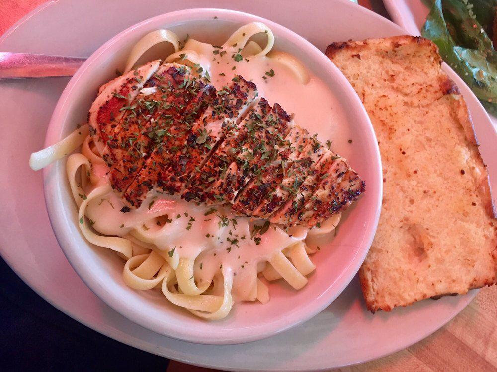 Chicken Fettuccini Alfredo · A hearty marinated chicken breast, grilled, sliced and placed atop a bed of fettuccini Alfredo. Dante favorites.