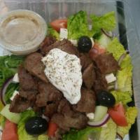Gyro Salad · Lettuce, tomato, onion, cucumber, feta cheese, olives, tzatziki sauce and gyro meat. Served ...