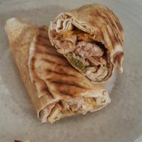 Chicken Shawarma Wrap · Chicken shawarma with homemade garlic sauce and pickles then toasted.