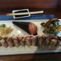 Megan Roll · Shrimp tempura, spicy tuna, avocado and crab wrapper with soy paper and spicy lobster on the...