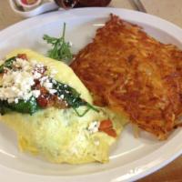 Greek Omelette · Tomatoes, spinach, oregano, and feta cheese.