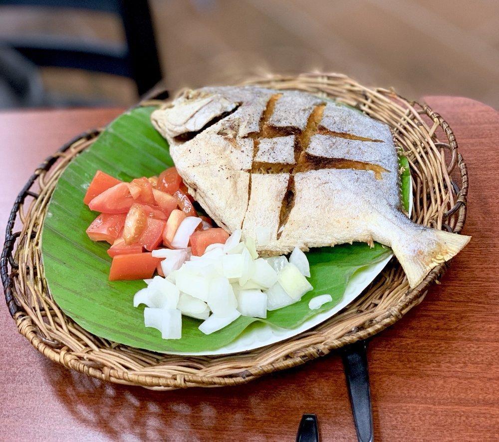 Fried Fish · Your choice of fish with a side of onion & tomato