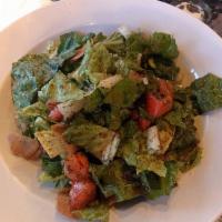 Fatoush Salad · Chopped romaine lettuce, tomato, cucumber, onion, parsley and crispy pita chips with sumac t...