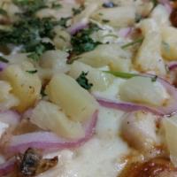 BBQ Chicken Pizza · Chicken marinated in BBQ sauce, red onions, cilantro and cheese.