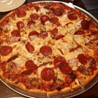 Meat Lovers Pizza · Sausage, bacon, pepperoni and Canadian bacon.