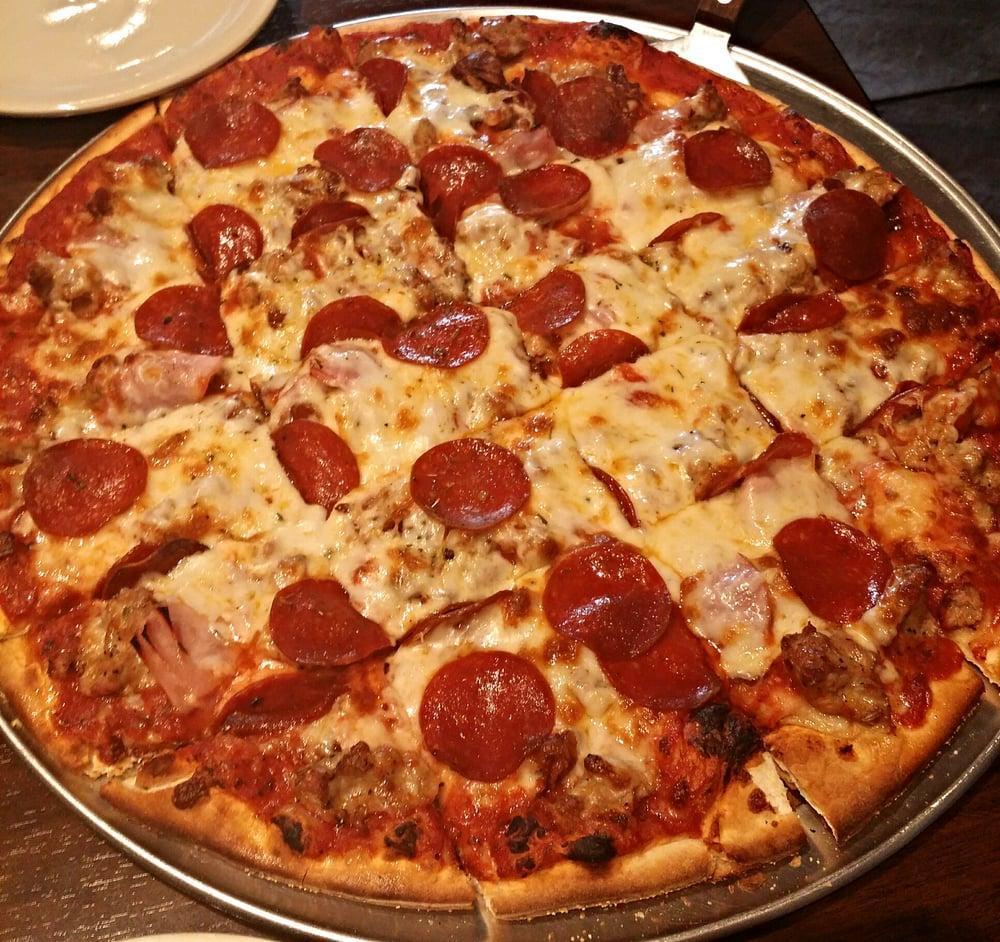 Meat Lovers Pizza · Sausage, bacon, pepperoni and Canadian bacon.