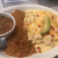 Enchiladas · 3 beef, chicken, or cheese enchiladas with any of our chili gravy, chili con queso, sour cre...
